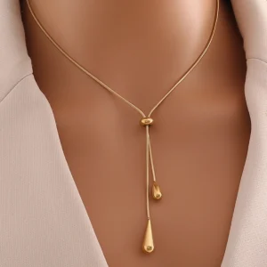 Gold teardrop tassel stainless steel necklace on model